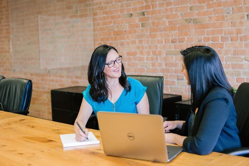 Two people having a one to one meeting