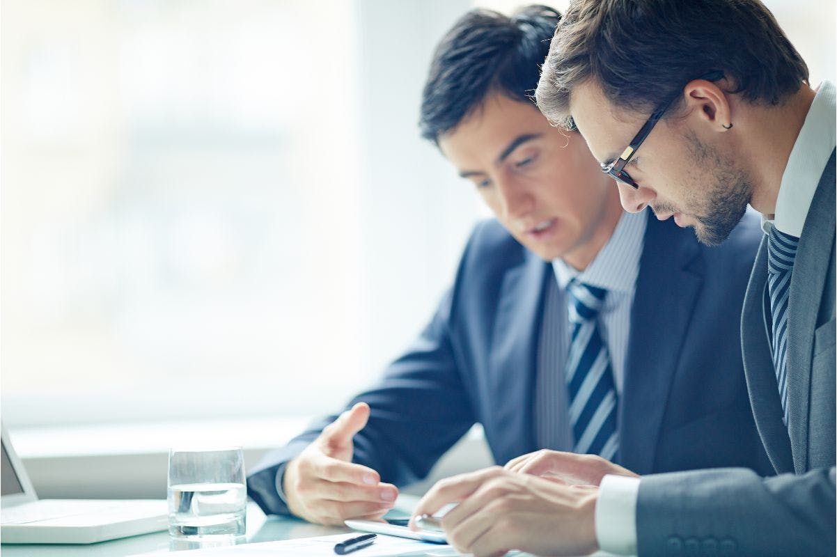 Two men reviewing their unconscious bias's