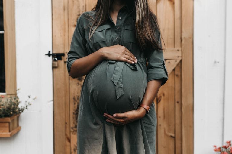 pregnant lady holding bump