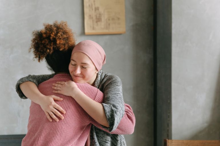 carer hugging their dependant on carers leave