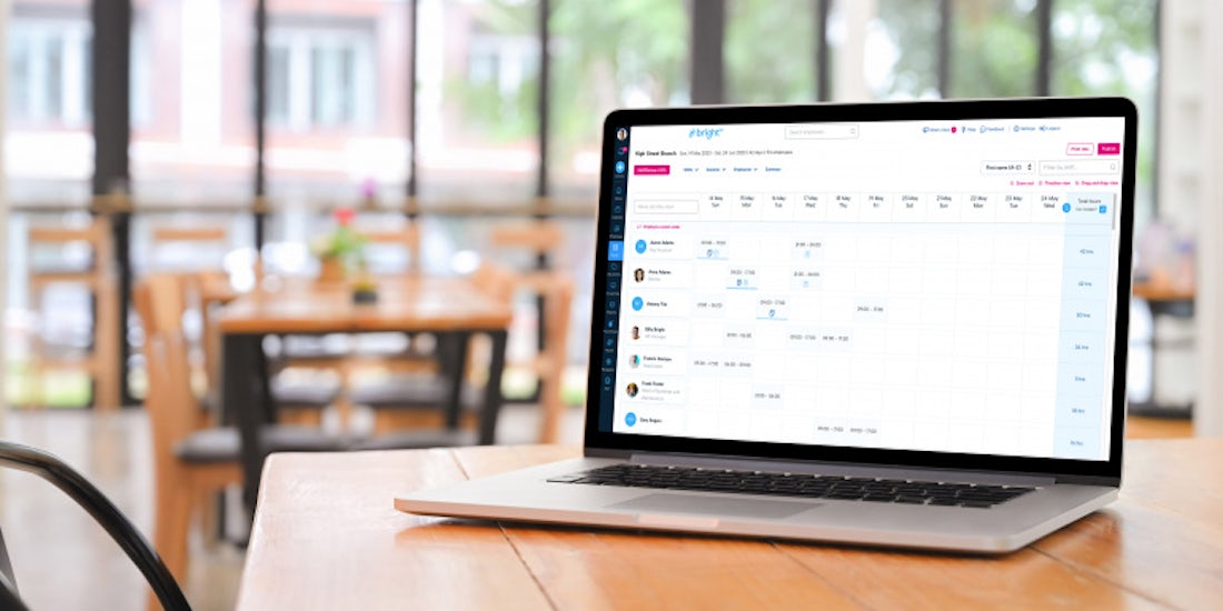 BrightHR's shift and rota planning software on a laptop screen in a coffee shop